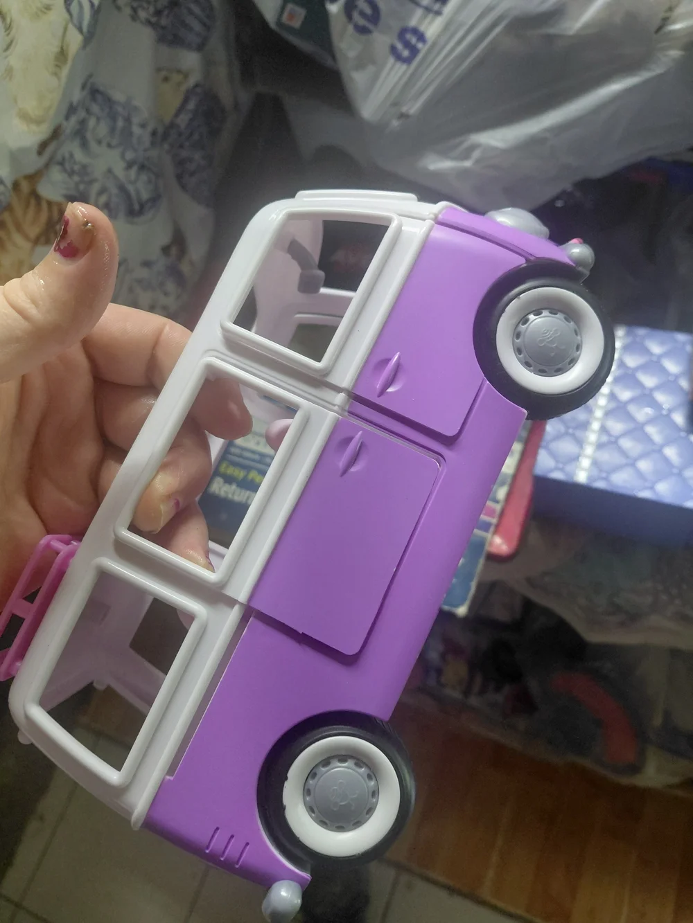 Honey Bee Acres Flower Groove Van toy, featuring a distinct purple and white VW-